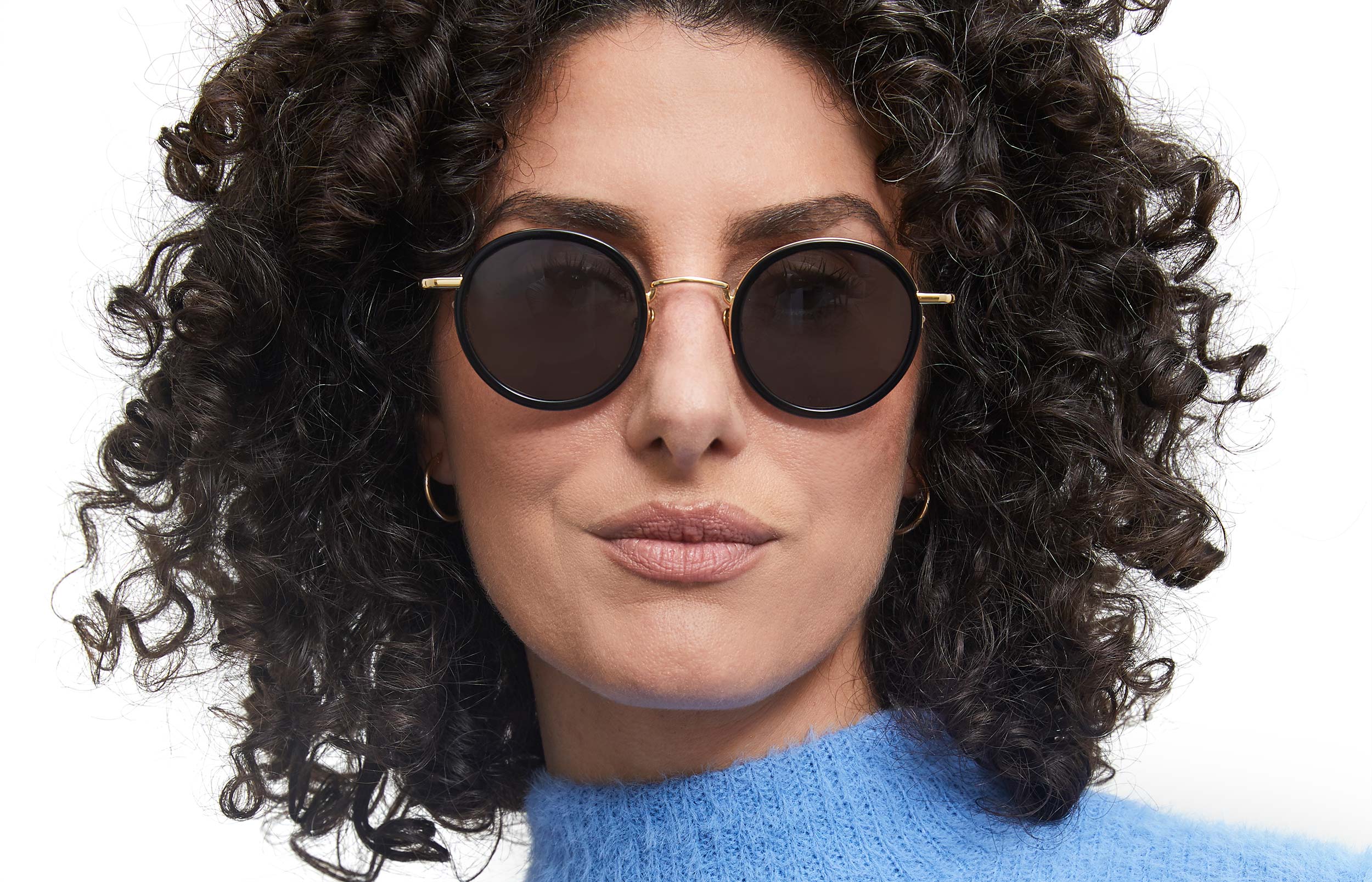 Photo of a man or woman wearing Nicolas Sun Dark Red & Gold Sun Glasses by French Kiwis