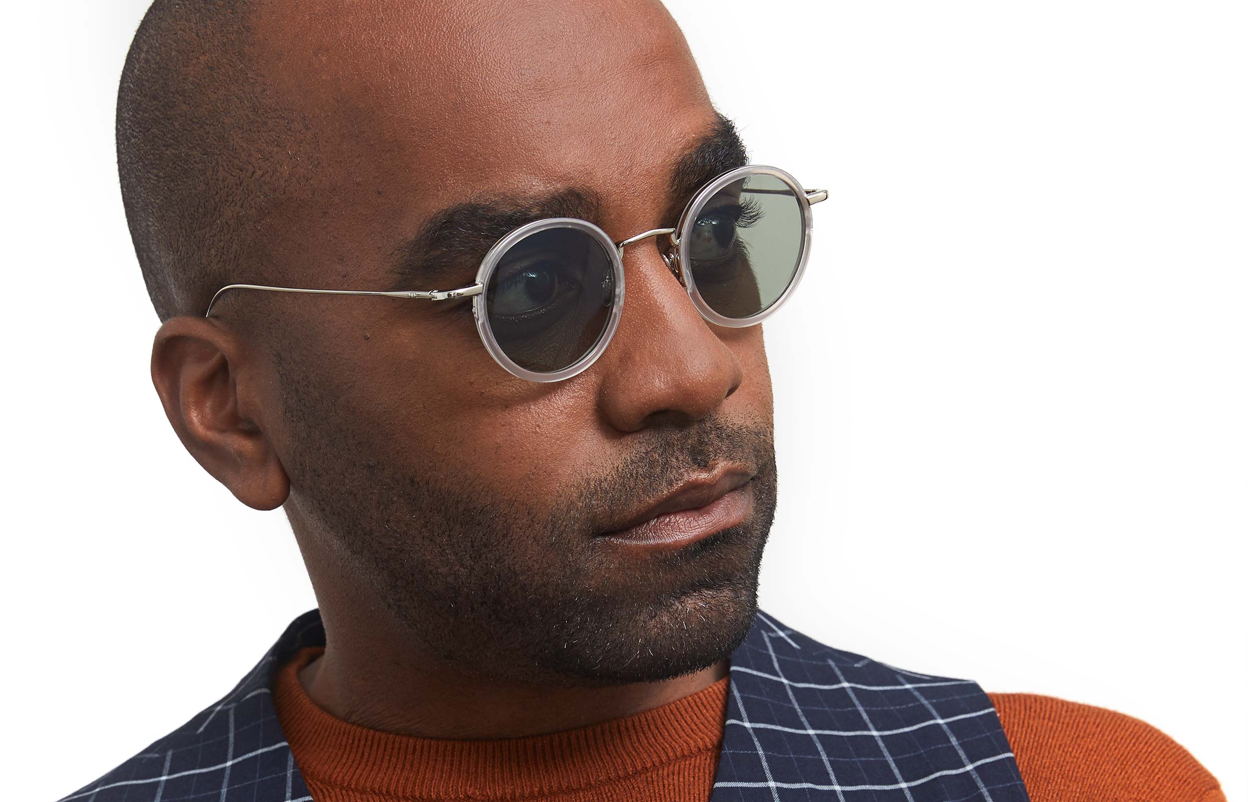 Photo of a man or woman wearing Nicolas Sun Dark Red & Gold Sun Glasses by French Kiwis