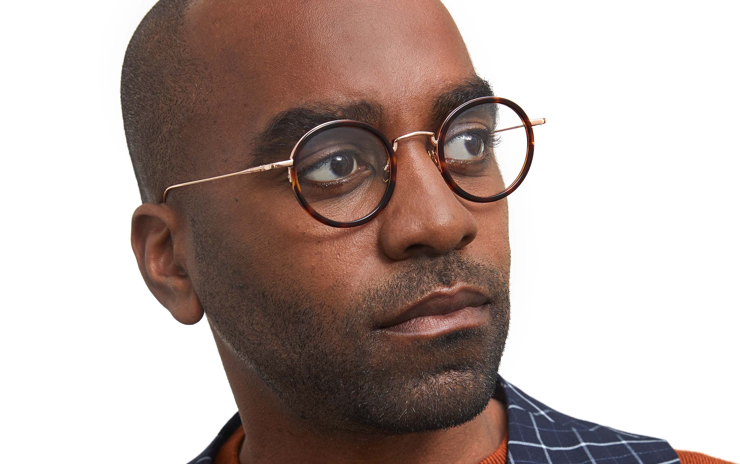 Photo of a man or woman wearing Nicolas Blue Light Dark Red & Gold Blue Light Glasses by French Kiwis
