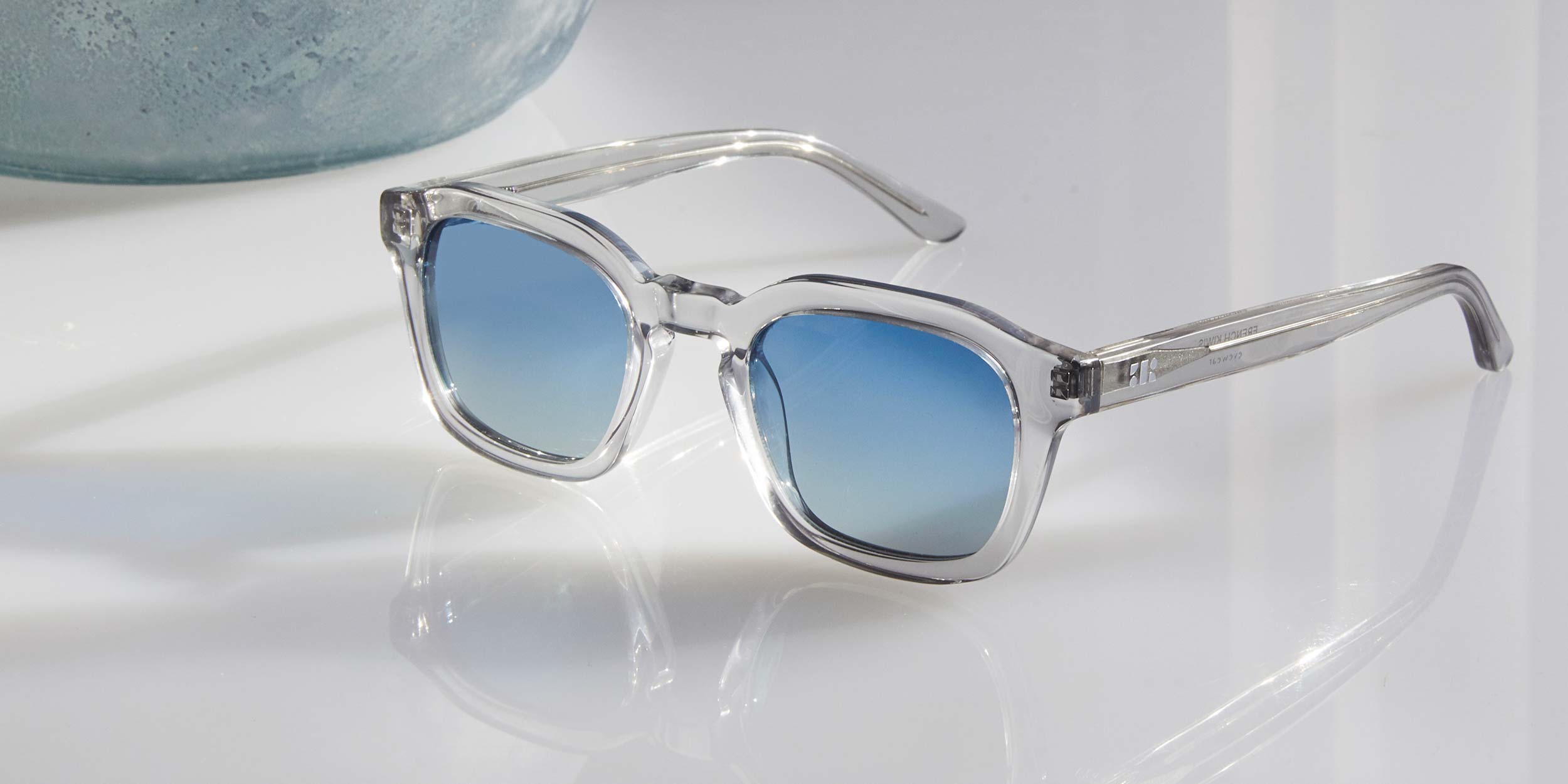 Photo Details of Oscar Sun Yellow Tortoise Sun Glasses in a room