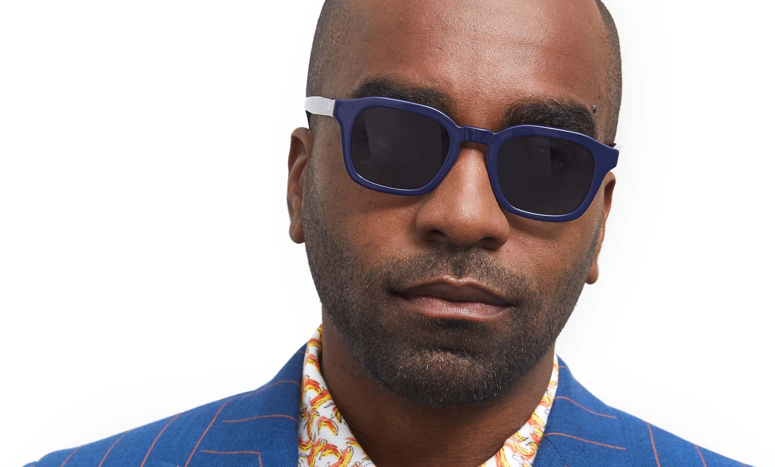Photo of a man or woman wearing Oscar Sun Clear Dark Olive Sun Glasses by French Kiwis