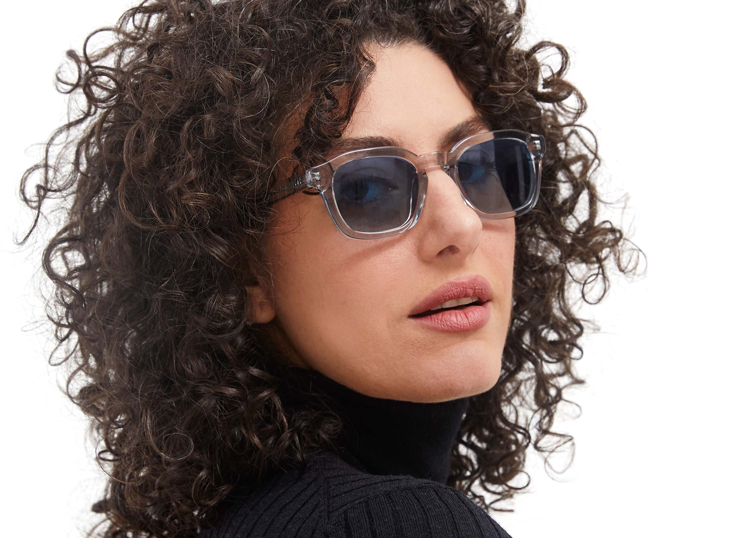 Photo of a man or woman wearing Oscar Sun Clear Dark Olive Sun Glasses by French Kiwis