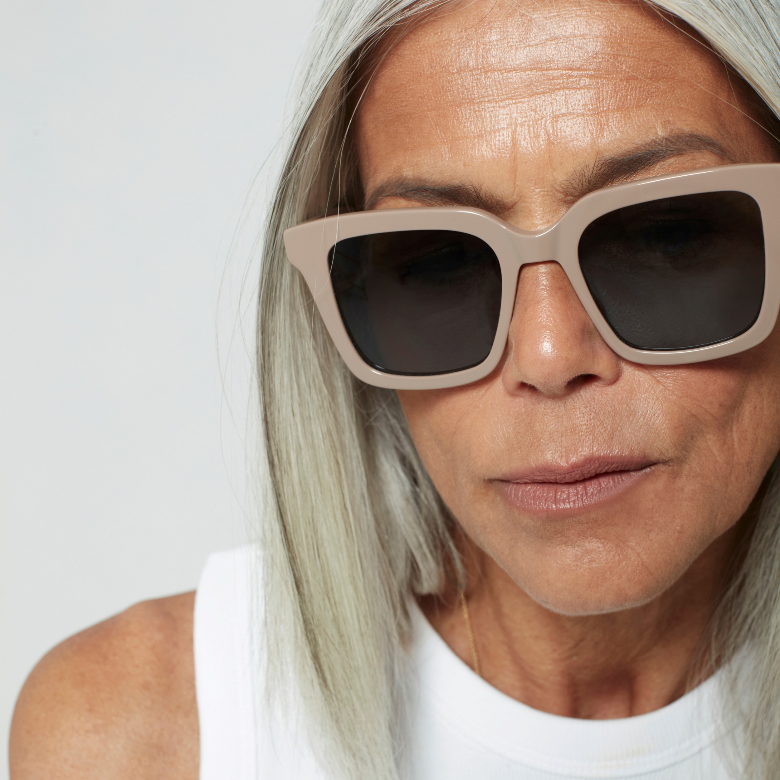 Photo of a man or woman wearing Jolie Sun Green Sun Glasses by French Kiwis