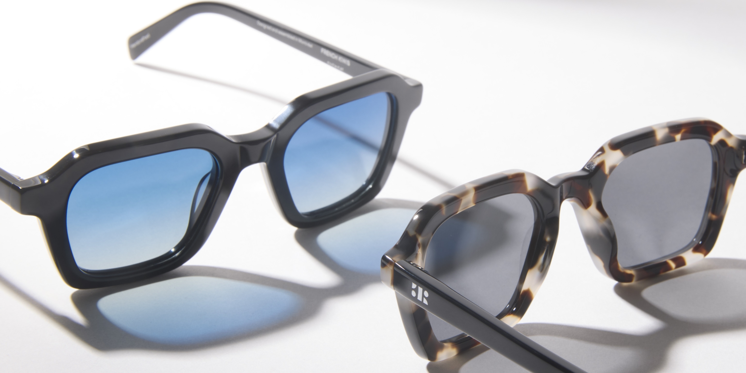 Photo Details of Lennox Sun Clear Dark Olive Sun Glasses in a room