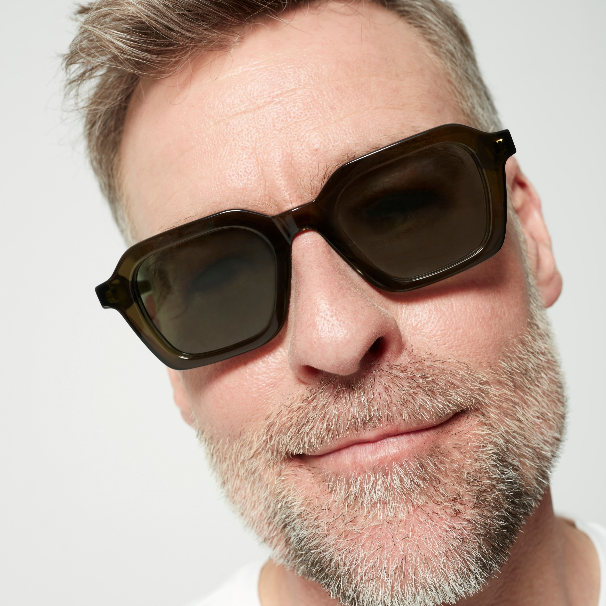 Photo of a man or woman wearing Lennox Sun Multi Grey Marble Sun Glasses by French Kiwis