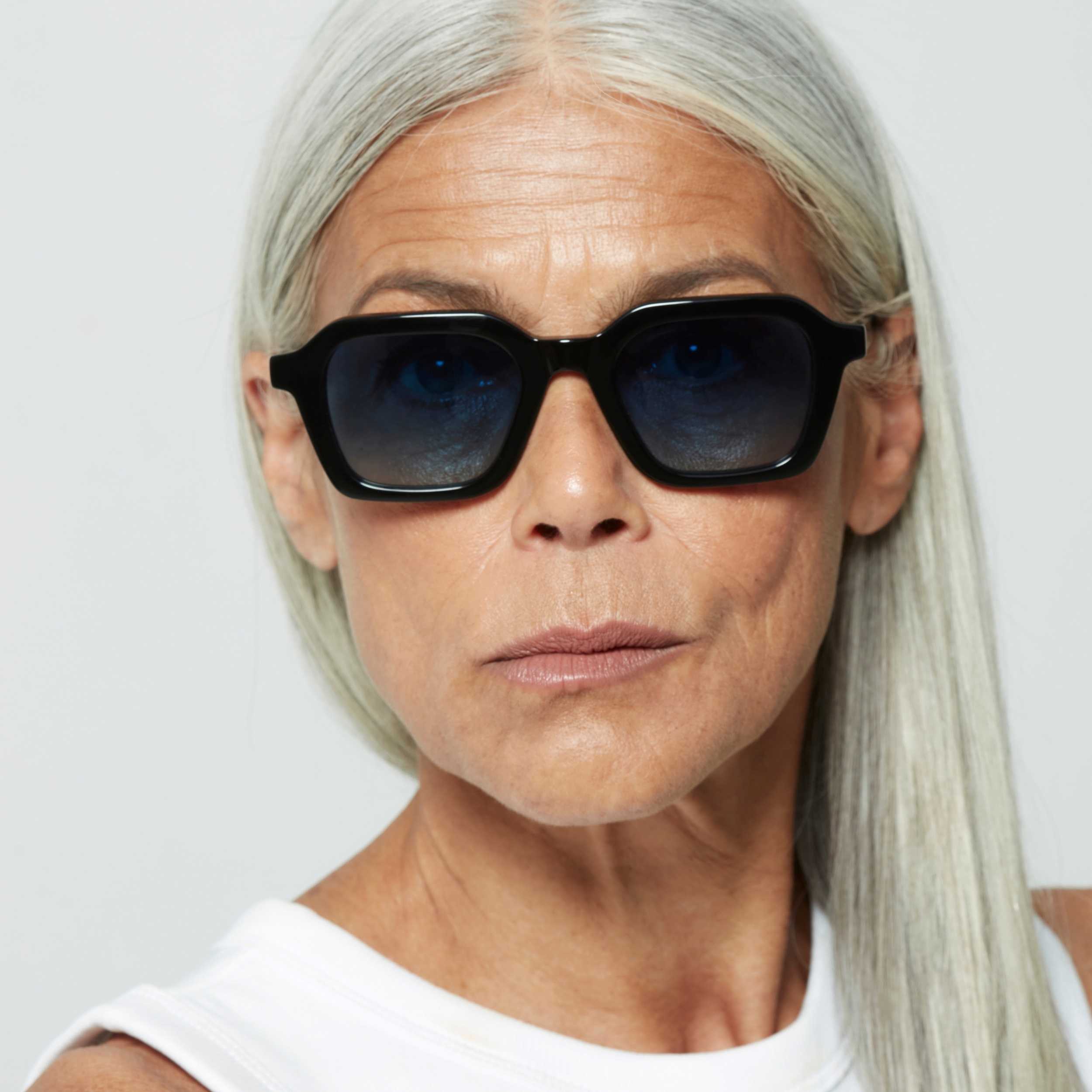 Photo of a man or woman wearing Lennox Sun Multi Grey Marble Sun Glasses by French Kiwis