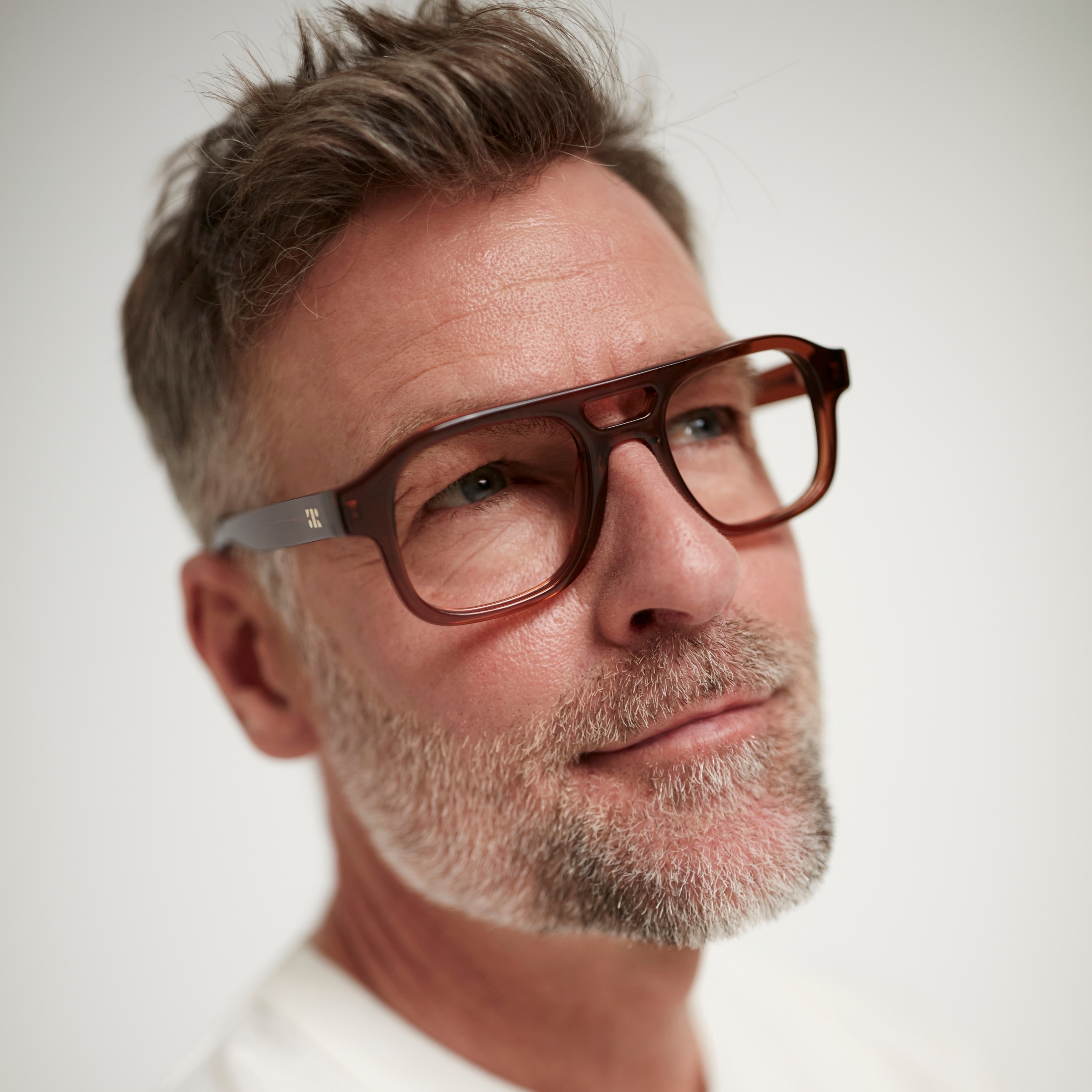 Photo of a man or woman wearing Lenny Blue Light Clear Stone Blue Blue Light Glasses by French Kiwis