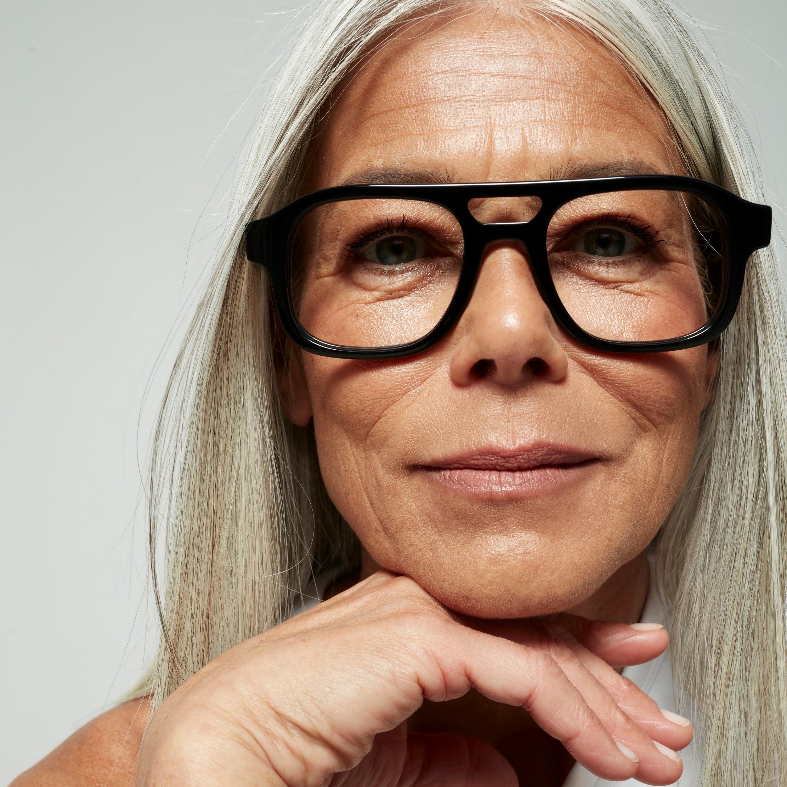 Photo of a man or woman wearing Lenny Blue Light Clear Stone Blue Blue Light Glasses by French Kiwis