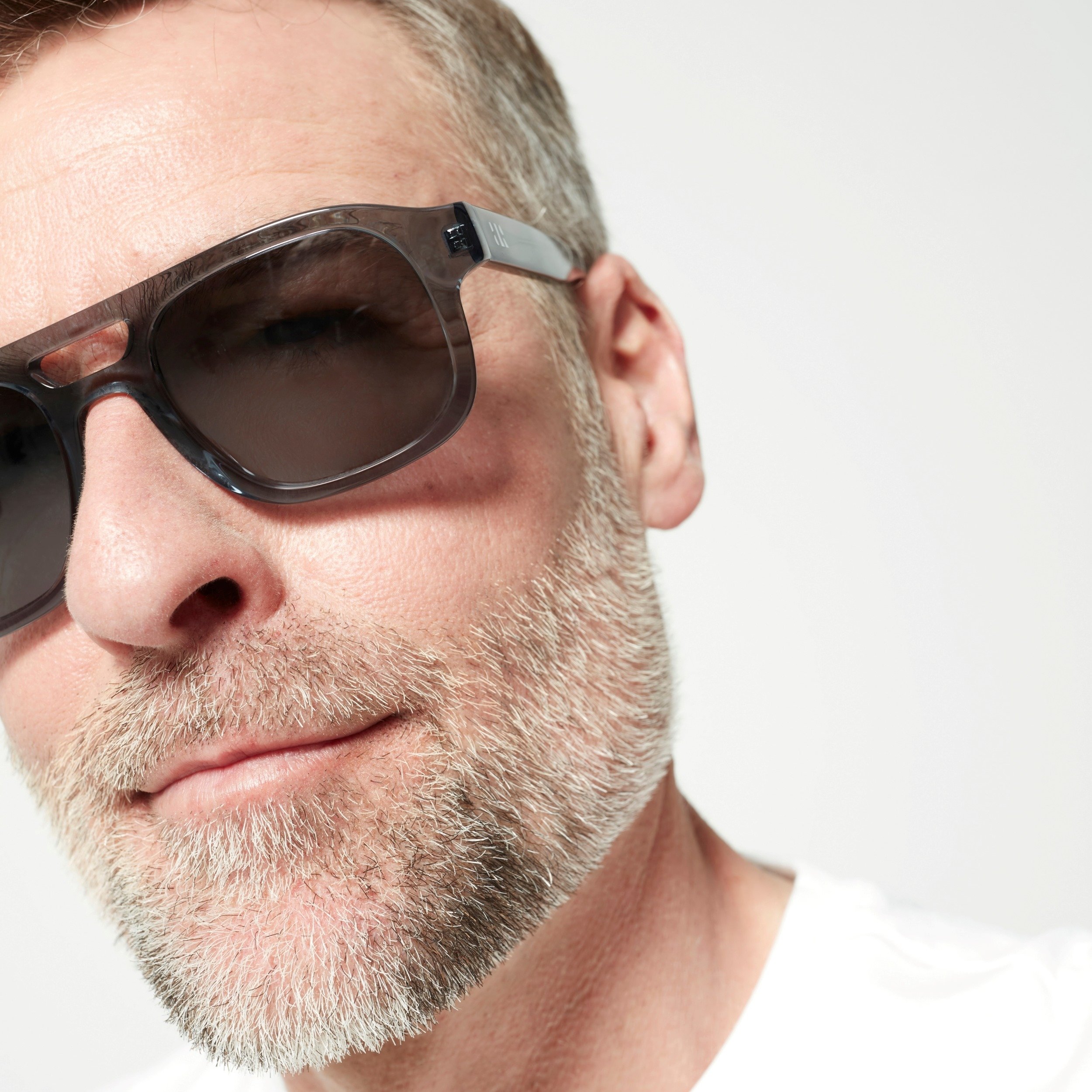 Photo of a man or woman wearing Lenny Sun Clear Mocha Sun Glasses by French Kiwis