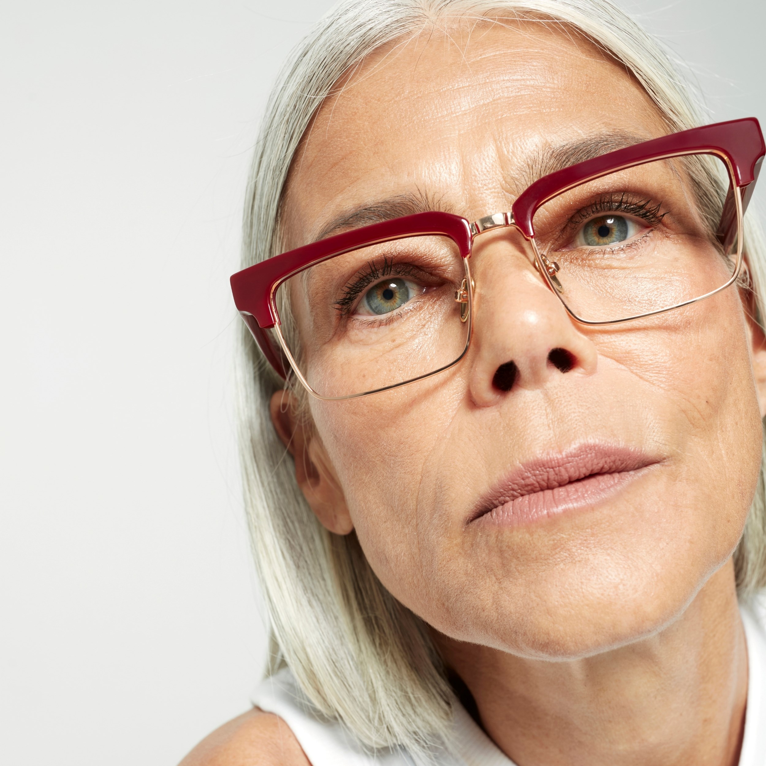 Photo of a man or woman wearing Paris Cream & Gold Reading Glasses by French Kiwis