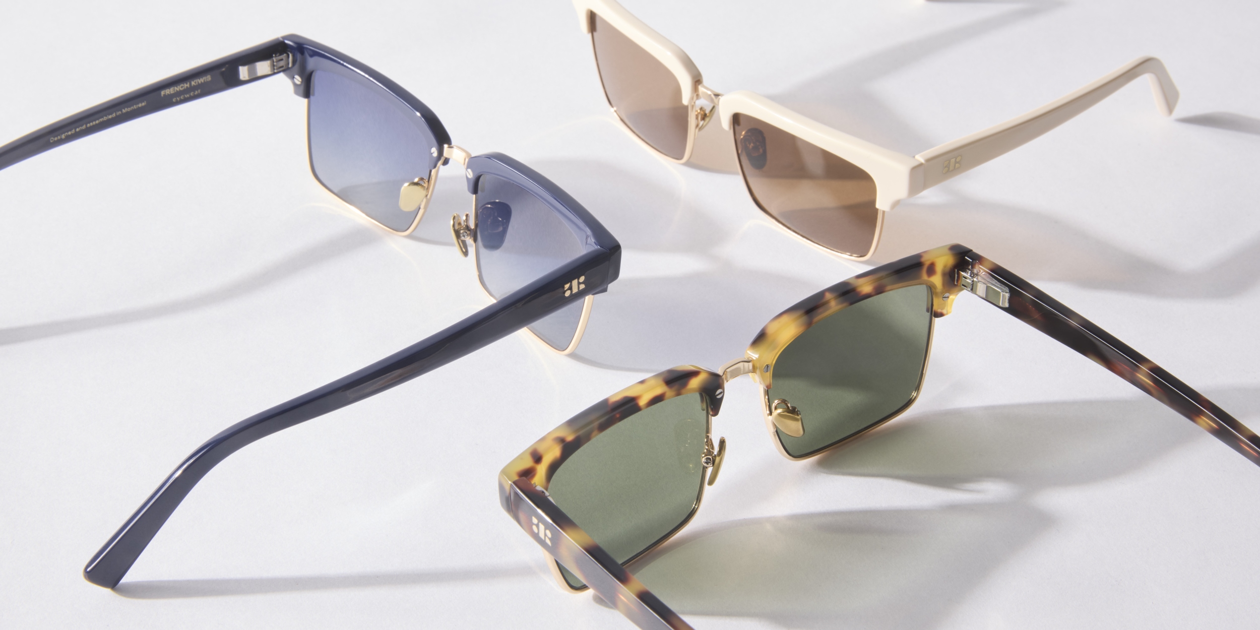 Photo Details of Paris Sun Cream & Gold Sun Glasses in a room