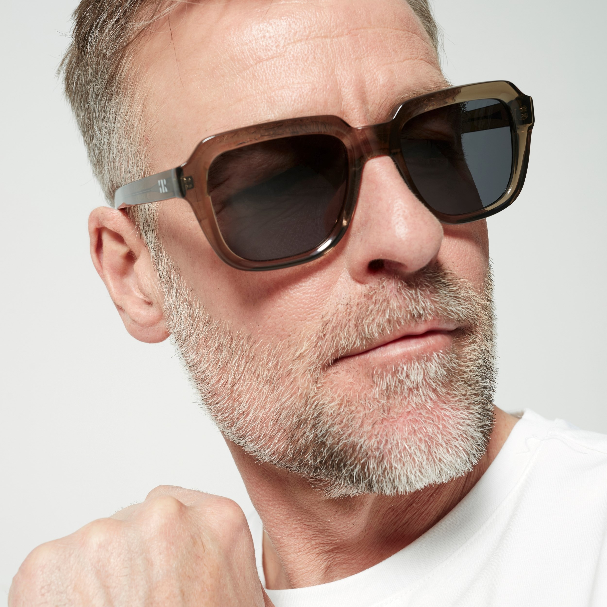 Photo of a man or woman wearing Reuben Sun Marron Tortoise Sun Glasses by French Kiwis