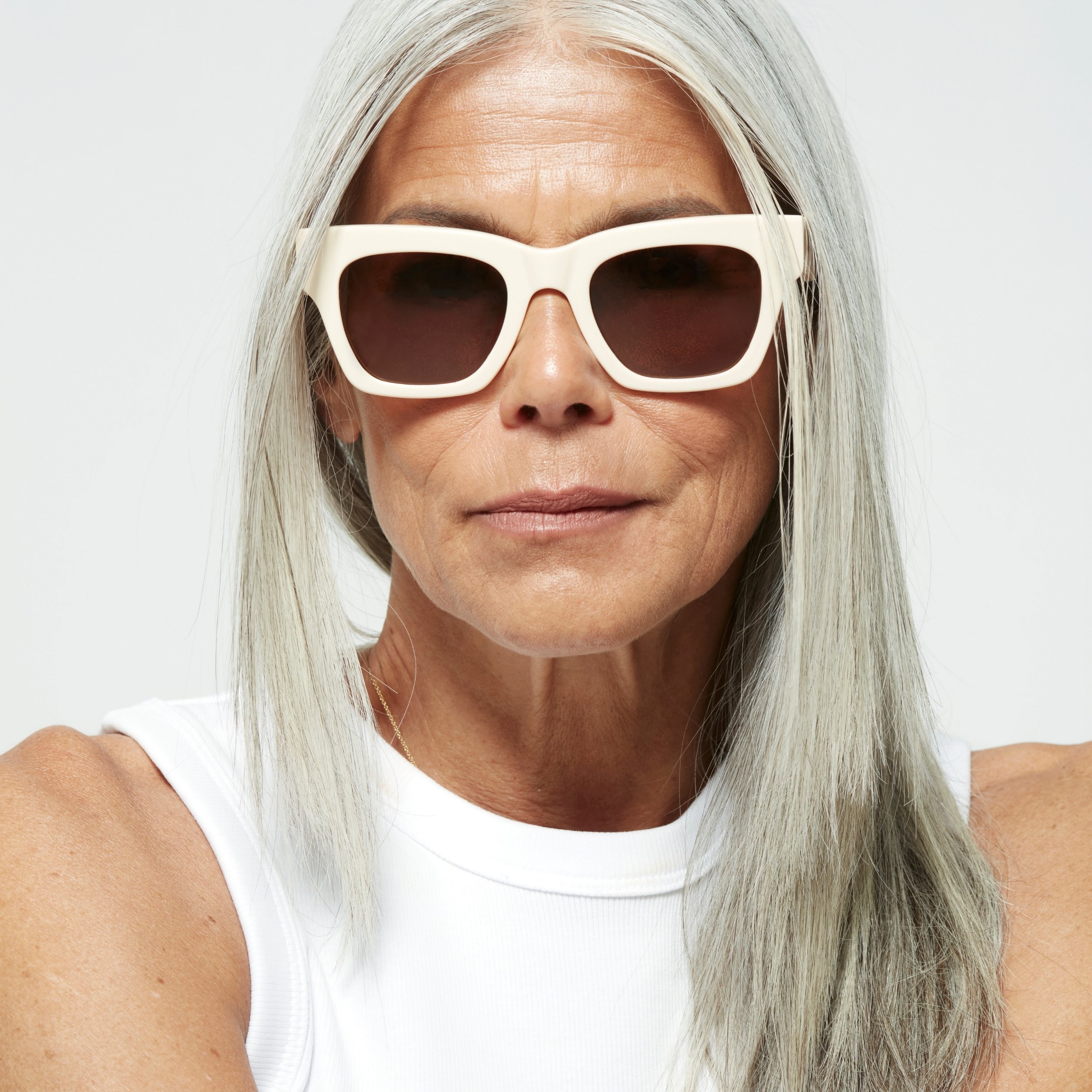 Photo of a man or woman wearing Rosalie Sun Cream Sun Glasses by French Kiwis