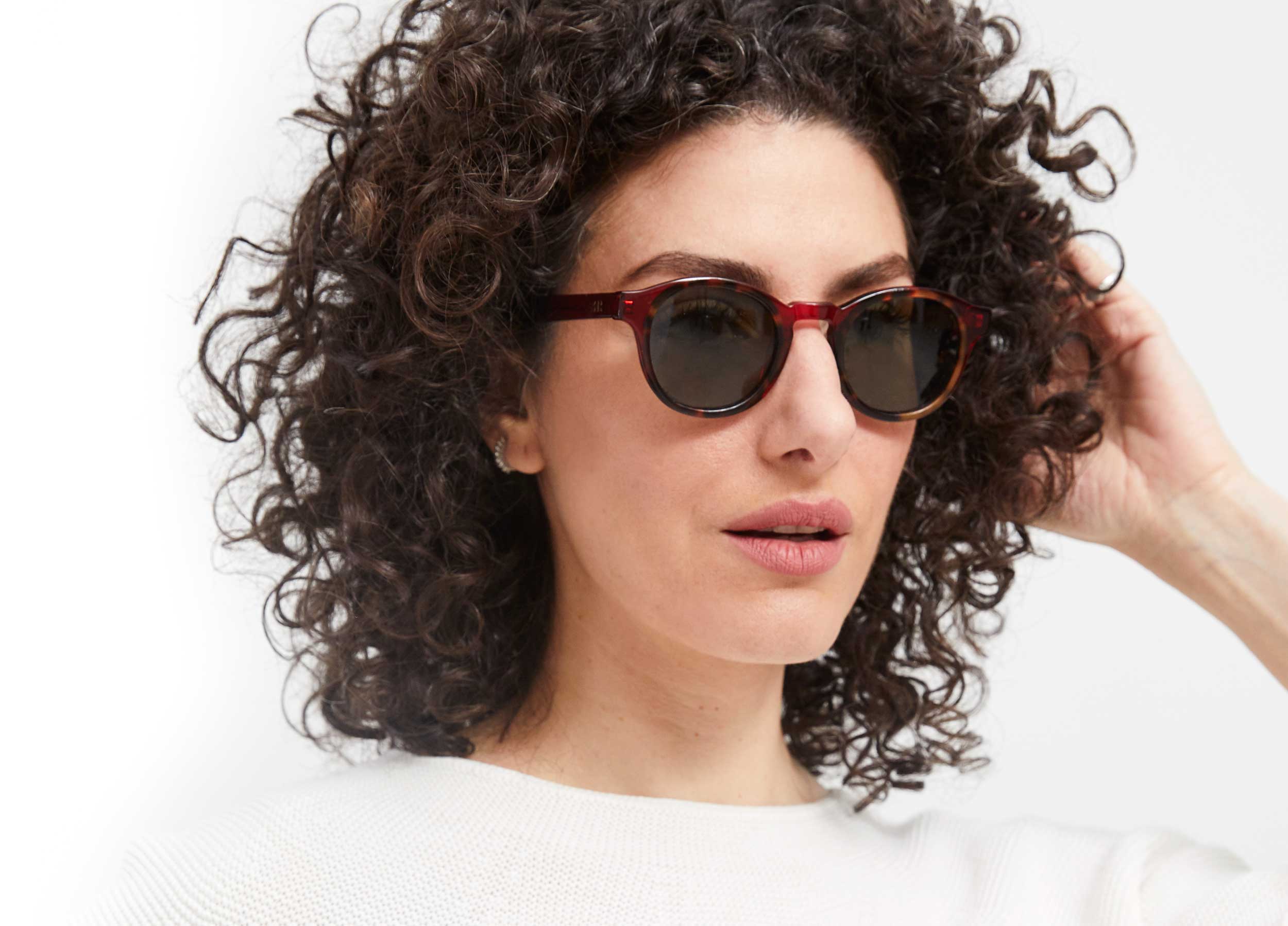 Photo of a man or woman wearing Alexis Sun Clear Burgundy and Blue Marble Sun Glasses by French Kiwis