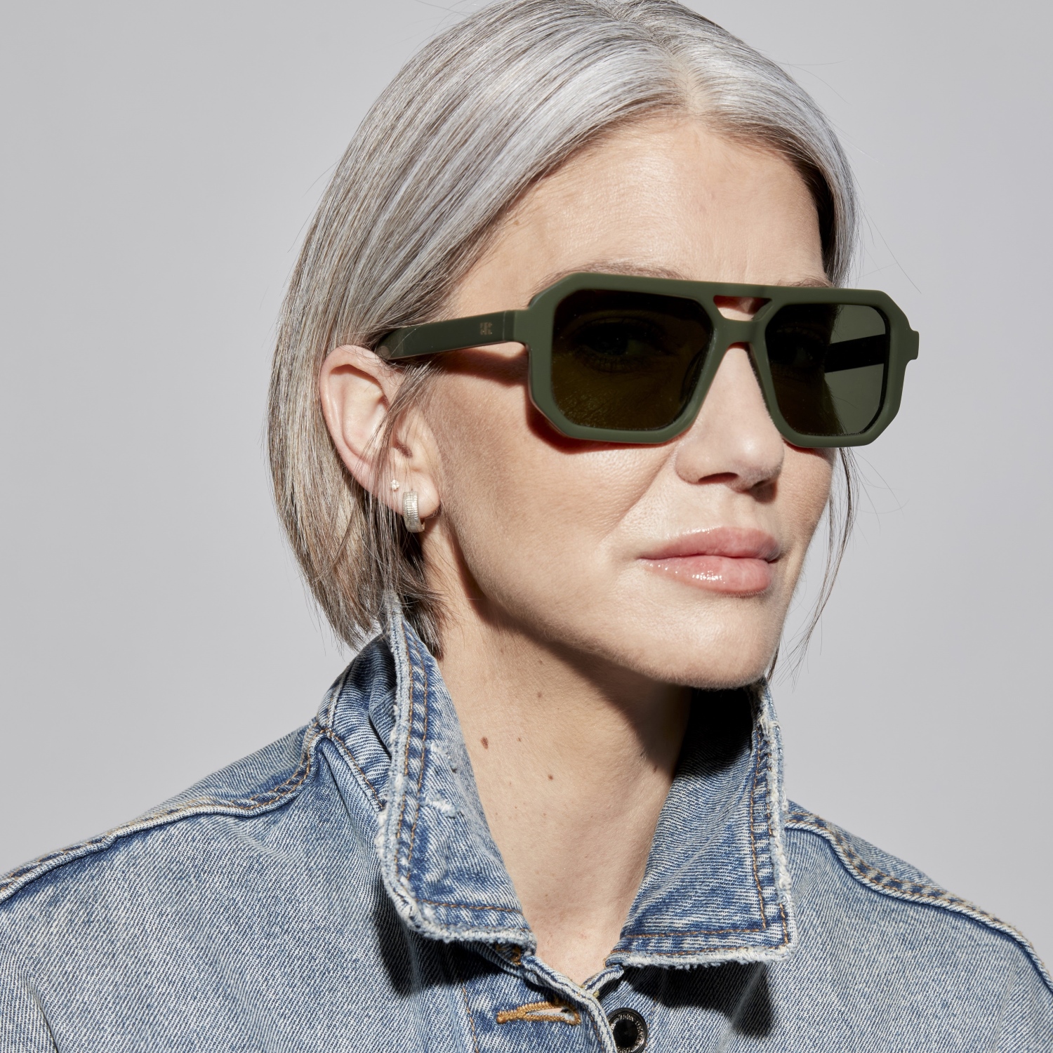 Photo of a man or woman wearing Angelo Sun Cream Sun Glasses by French Kiwis