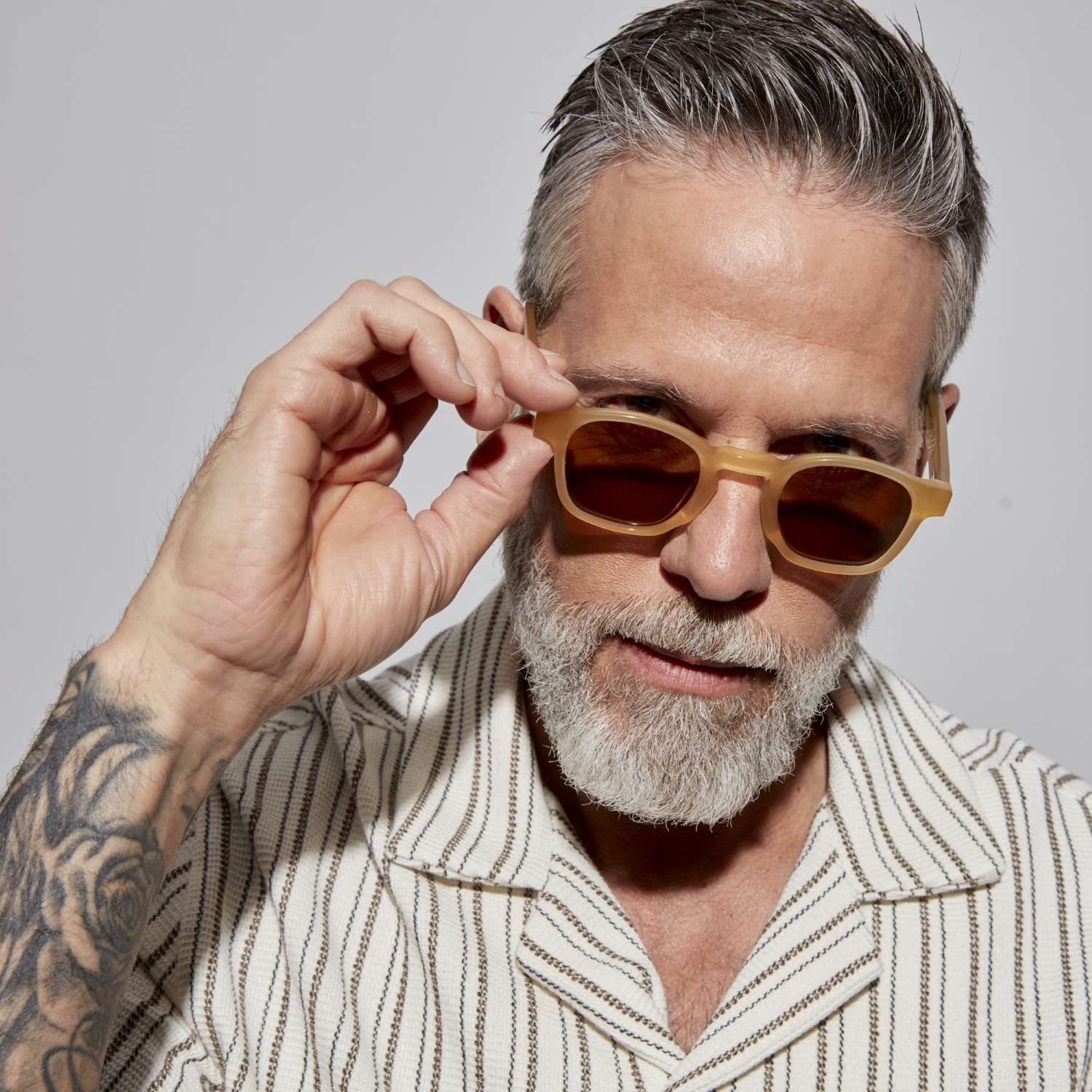 Photo of a man or woman wearing Enzo Sun Dark Red Sun Glasses by French Kiwis