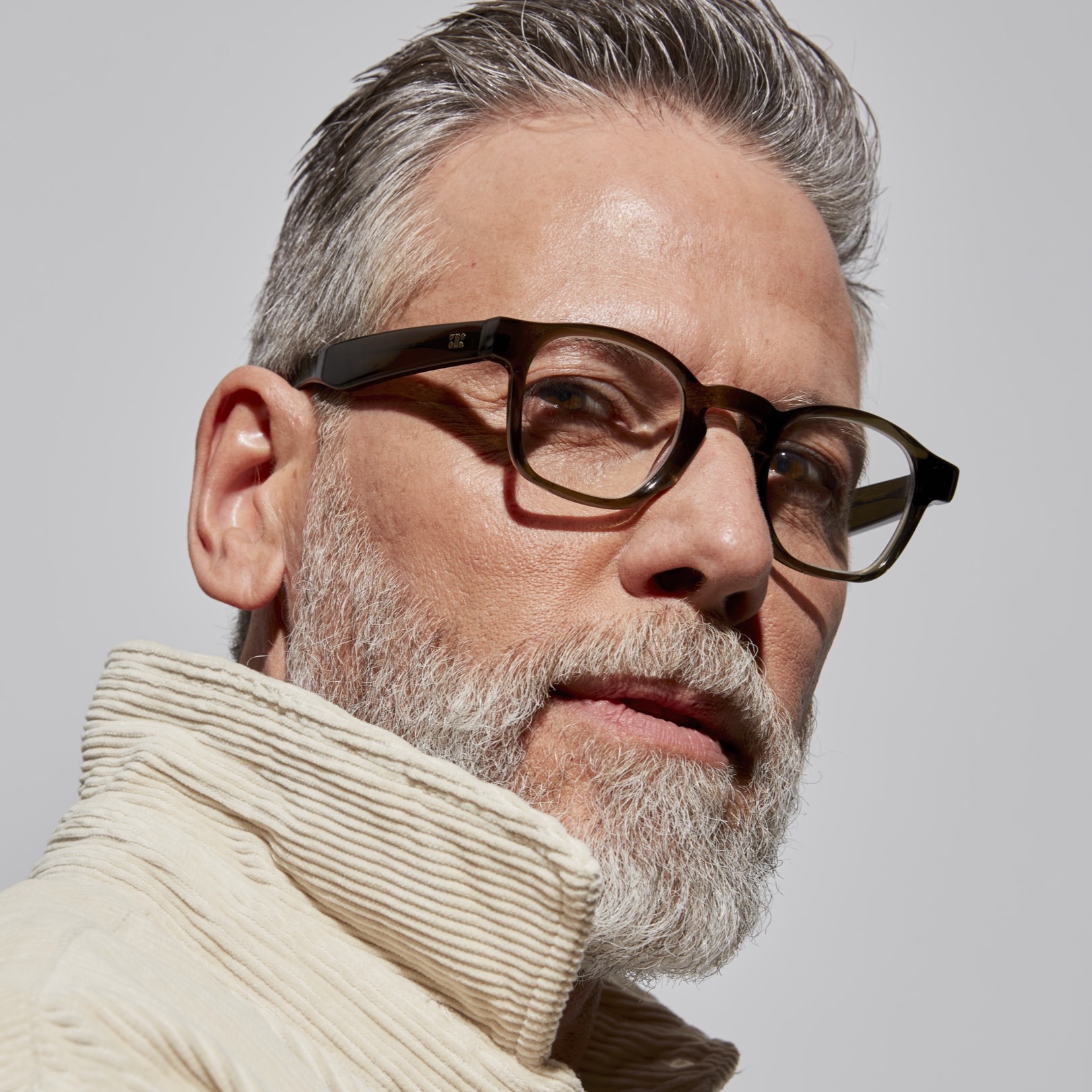 Photo of a man or woman wearing Enzo Blue Light Clear Stone Blue Blue Light Glasses by French Kiwis