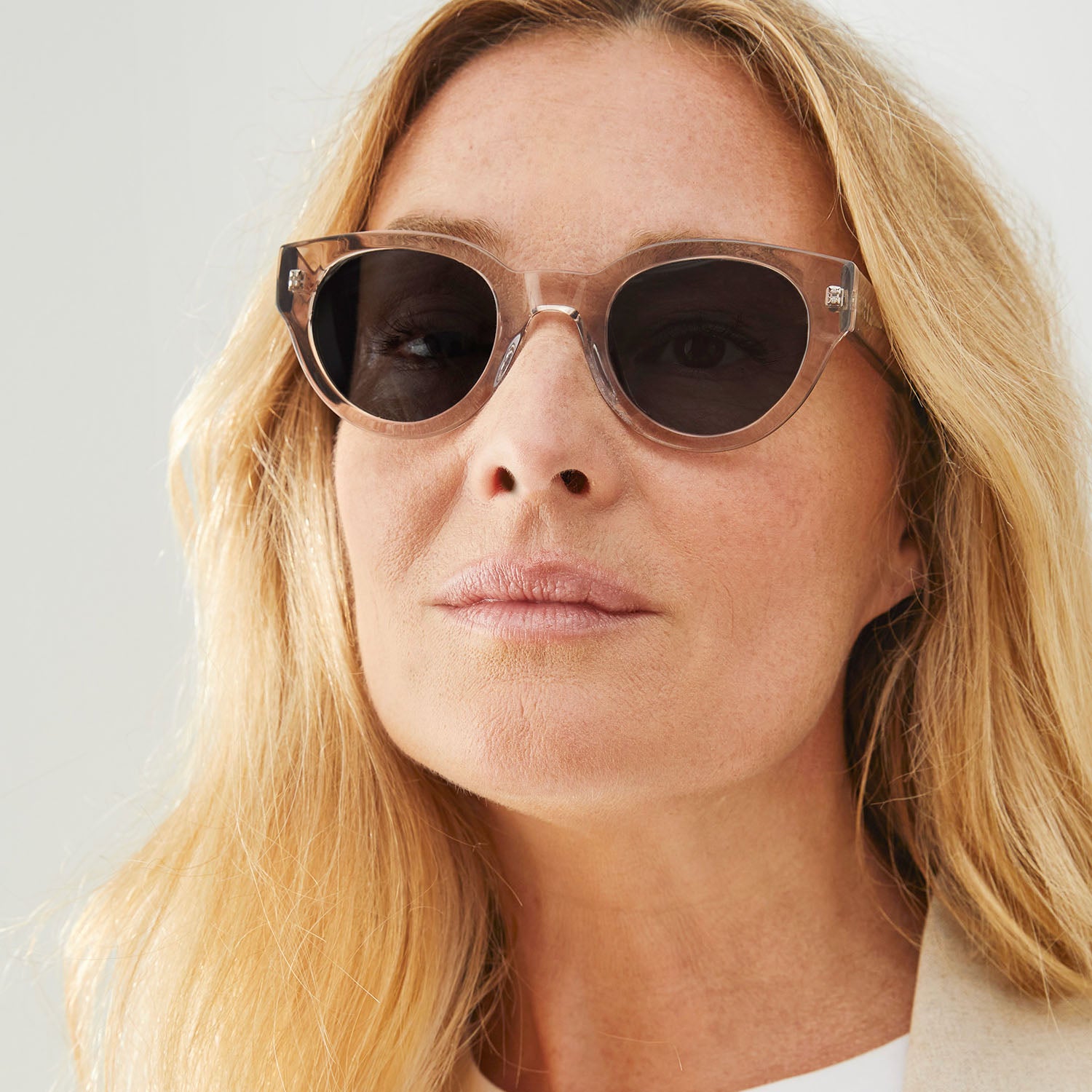 Photo of a man or woman wearing Florence Sun Dark Tortoise Sun Glasses by French Kiwis