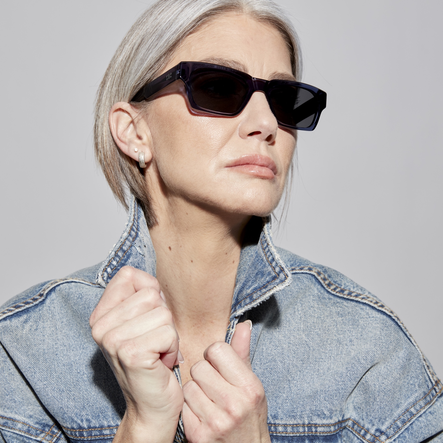 Photo of a man or woman wearing Leon Sun Dark Red Sun Glasses by French Kiwis