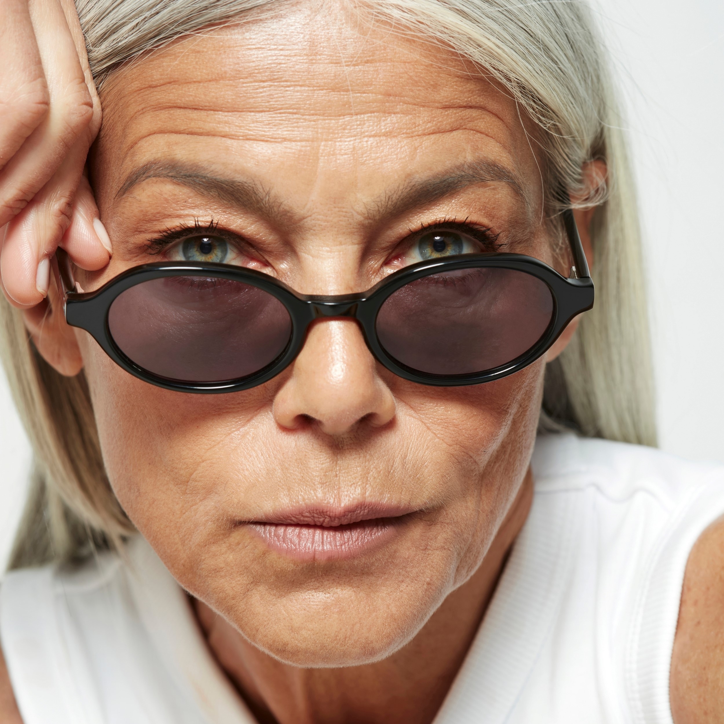 Photo of a man or woman wearing Mila Sun Dark Red Sun Glasses by French Kiwis