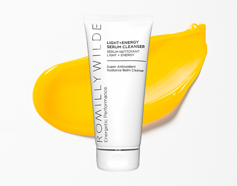 Light + Energy Serum Cleanser on top of bright yellow texture