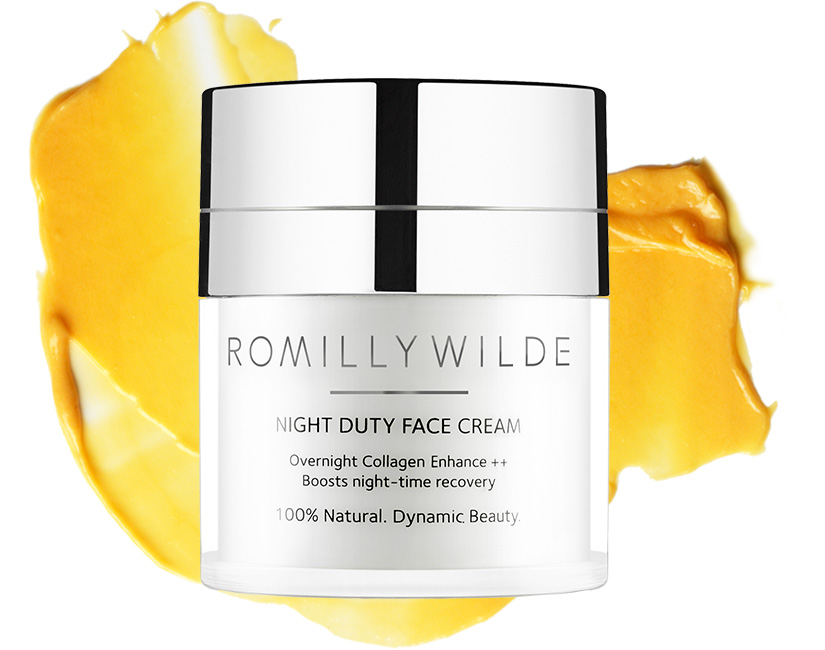 Night Duty Face Cream on top of bright yellow texture