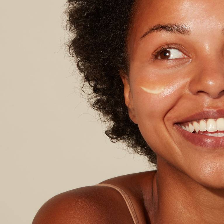 Women's Face With Luminous, Hydrated Skin