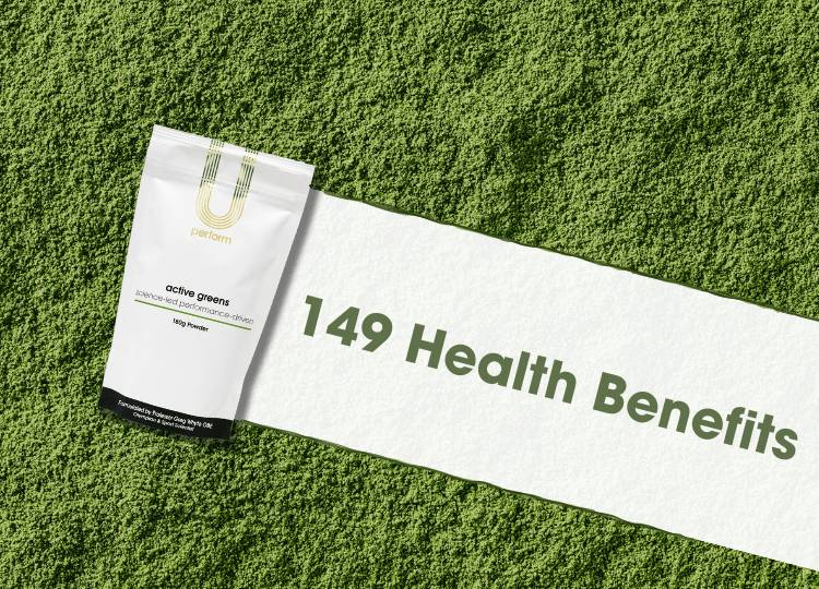 U Perform Active Greens packet on a background of green powder with the words 149 health benefits in the powder trail