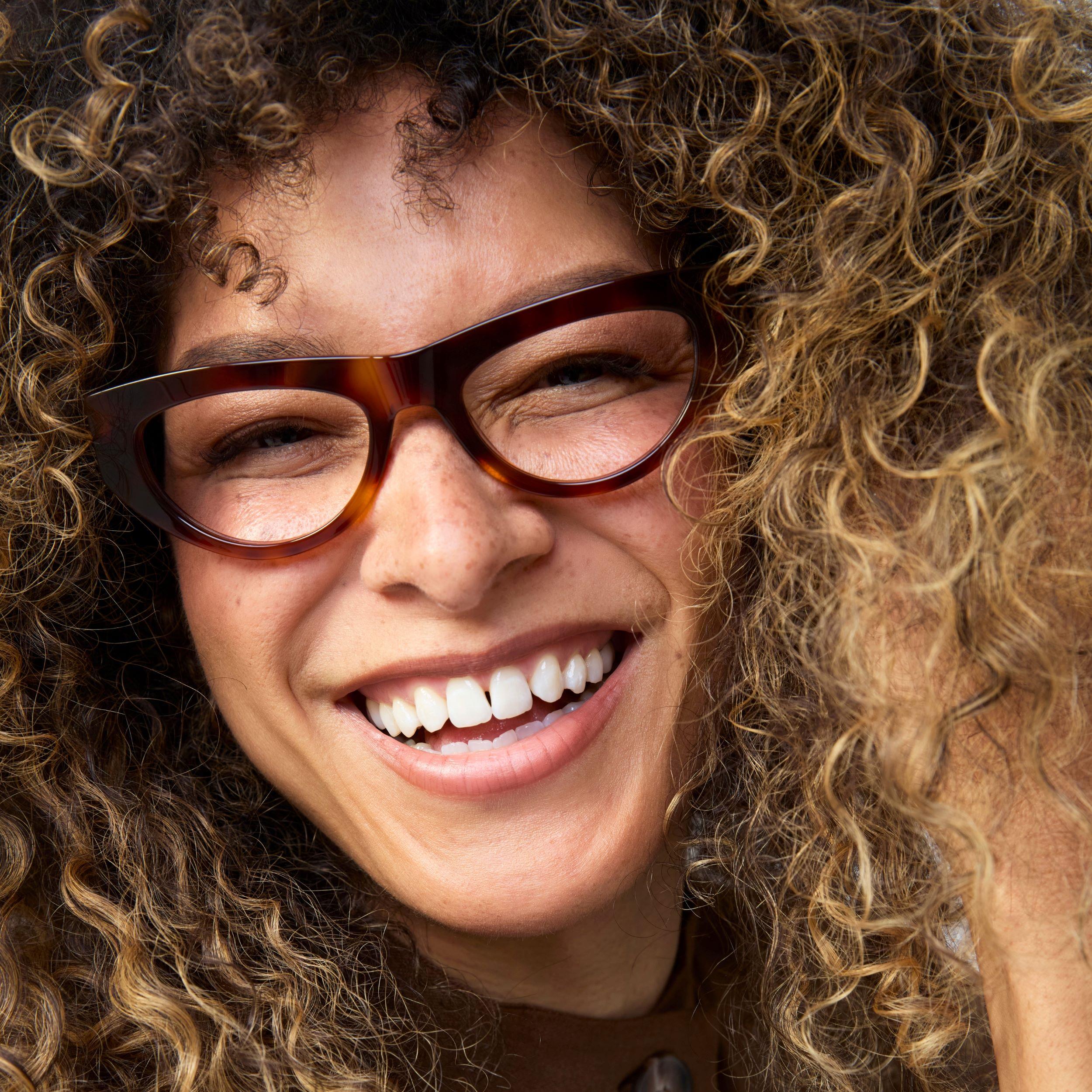 Photo of a man or woman wearing Béatrice Black Reading Glasses by French Kiwis
