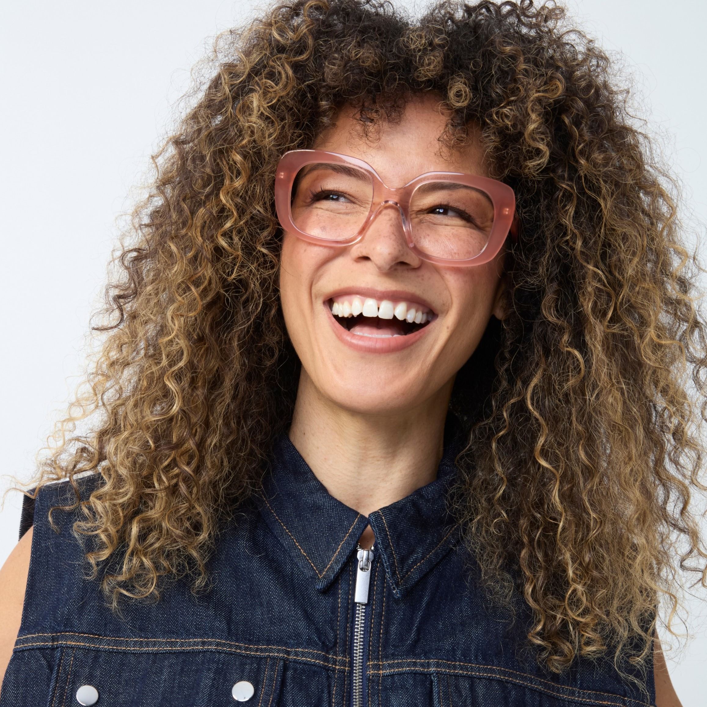Photo of a man or woman wearing Celeste Blue Light Gradient Chocolate Brown Blue Light Glasses by French Kiwis