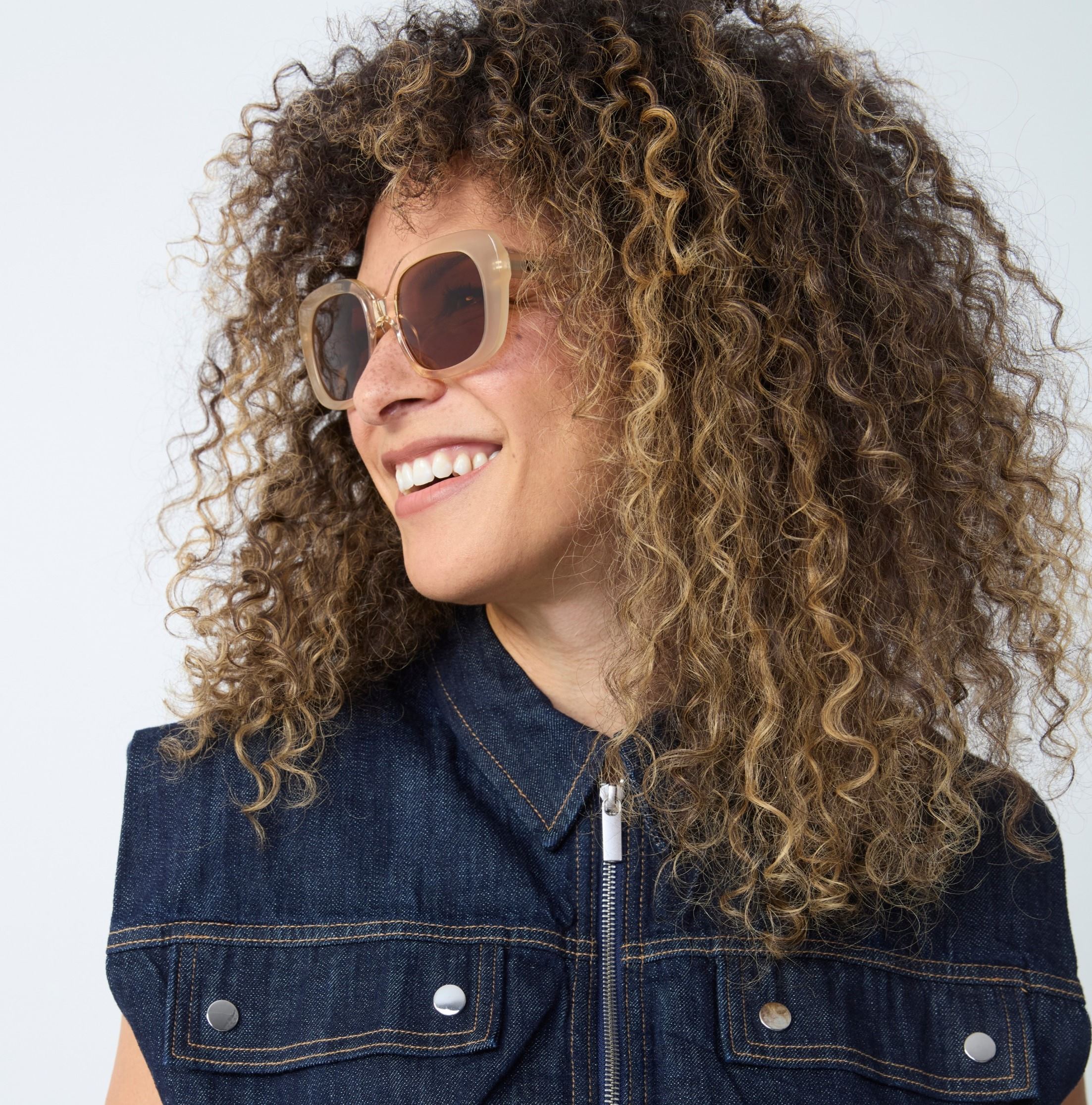 Photo of a man or woman wearing Celeste Sun Gradient Black Sun Glasses by French Kiwis