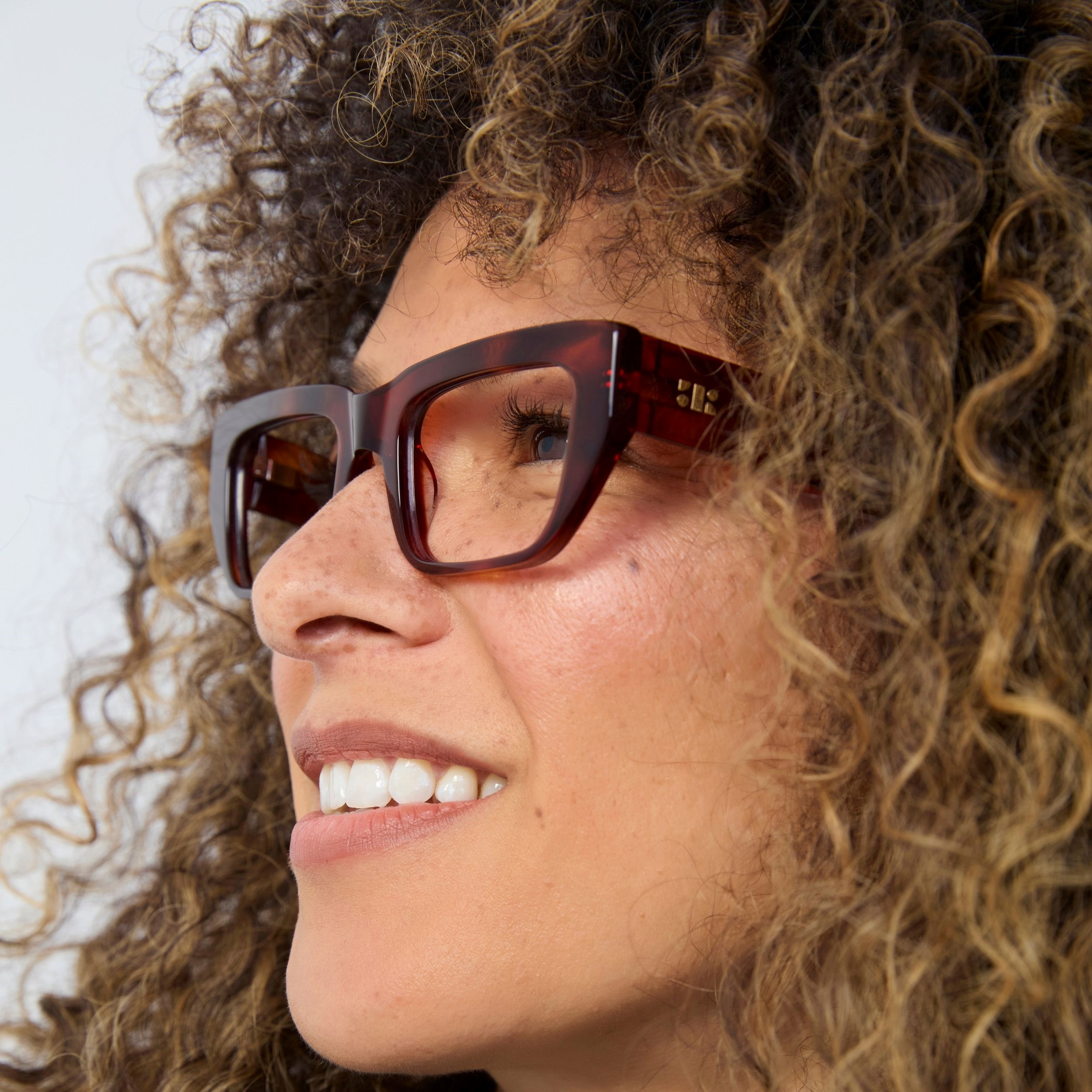 Photo of a man or woman wearing Kai Fire Tortoise Reading Glasses by French Kiwis