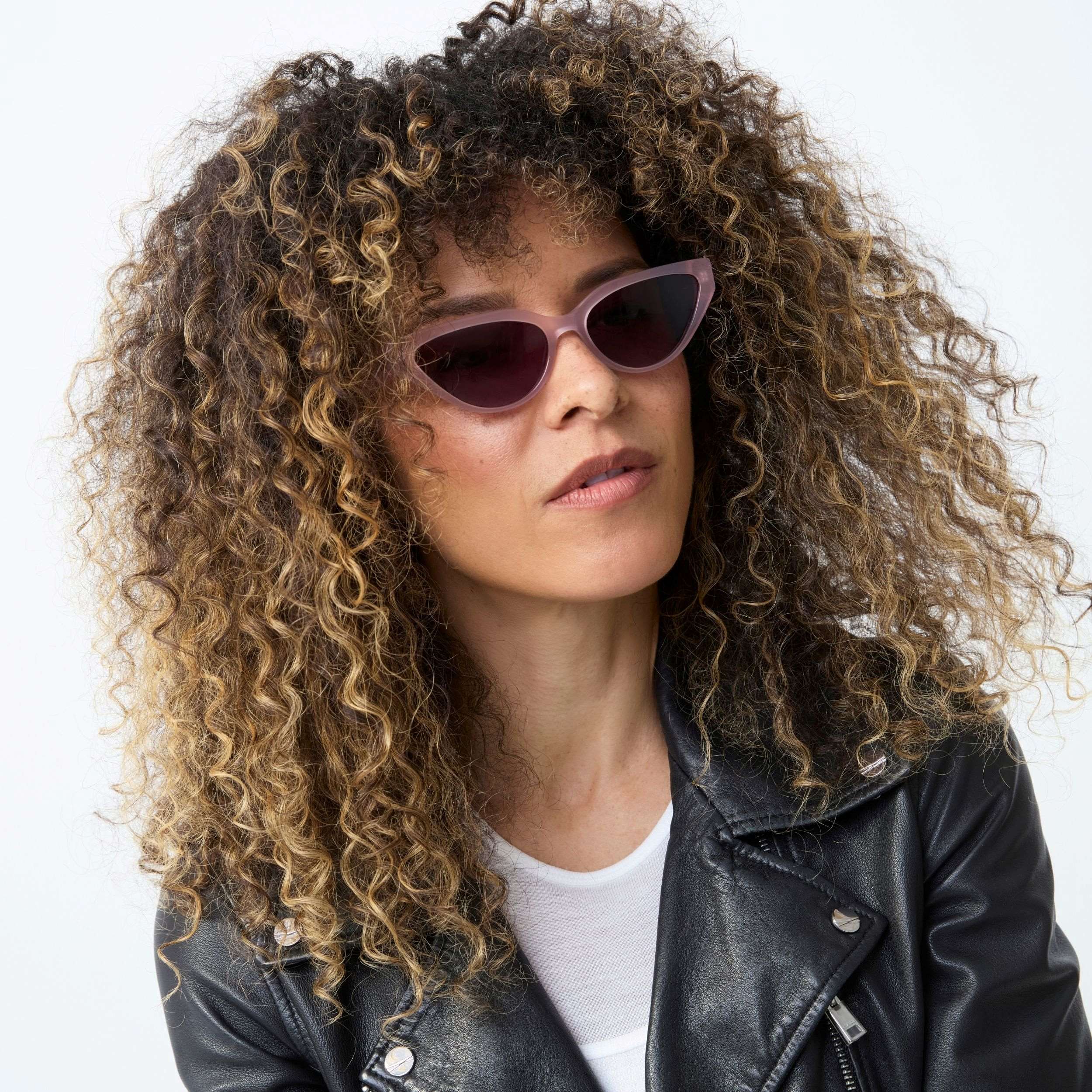 Photo of a man or woman wearing Nikki Sun Milky Purple Sun Glasses by French Kiwis