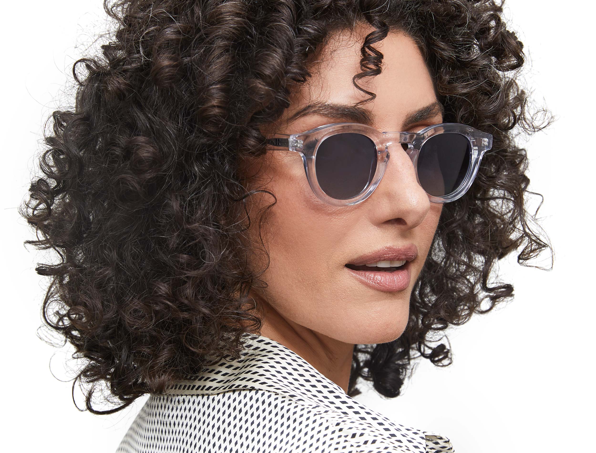 Photo of a man or woman wearing Jude Sun Clear Dark Olive Sun Glasses by French Kiwis