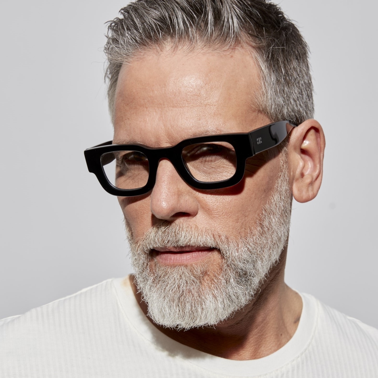 Photo of a man or woman wearing Valentin Milky grey Reading Glasses by French Kiwis