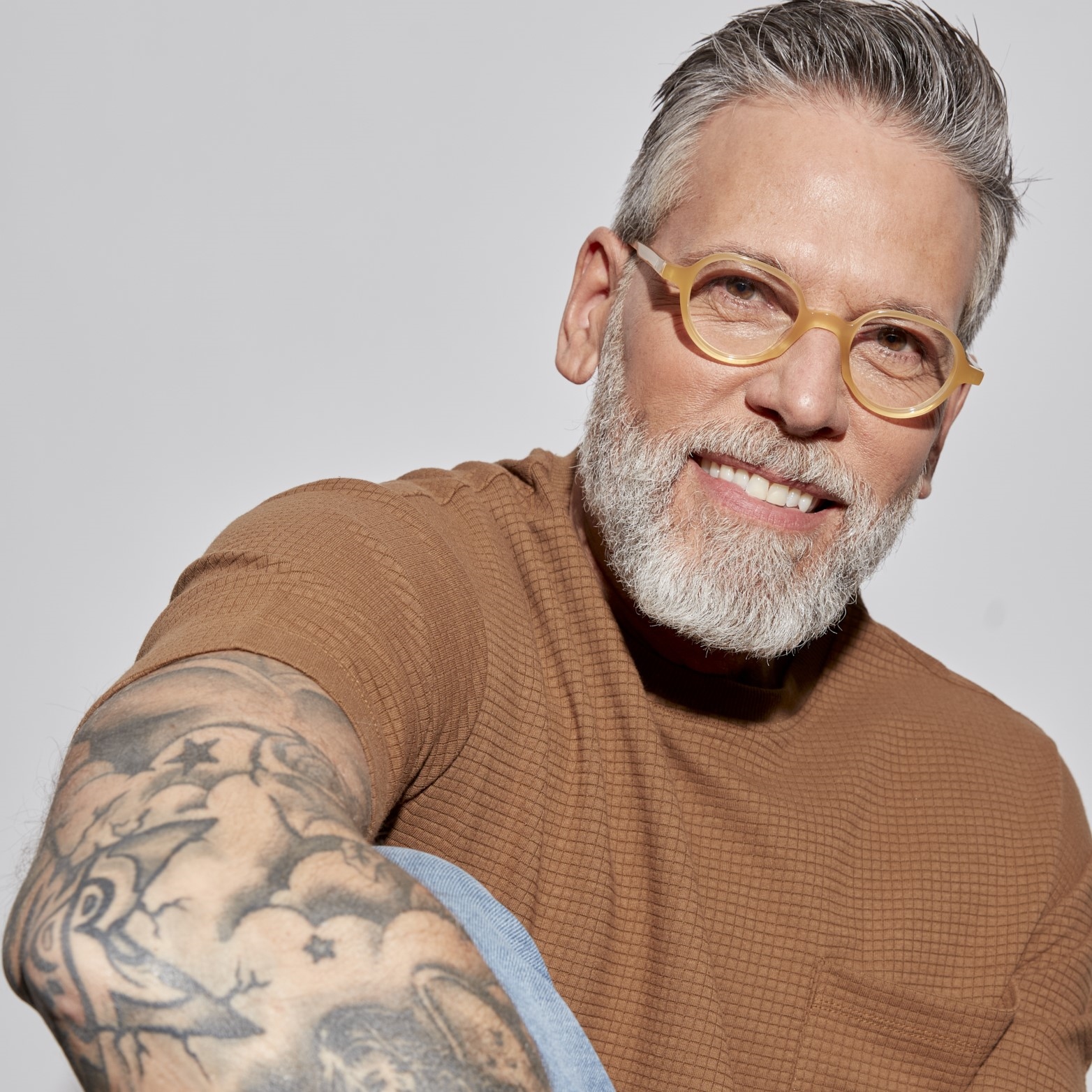 Photo of a man or woman wearing Gaby Blue Light Clear Dark Olive Blue Light Glasses by French Kiwis