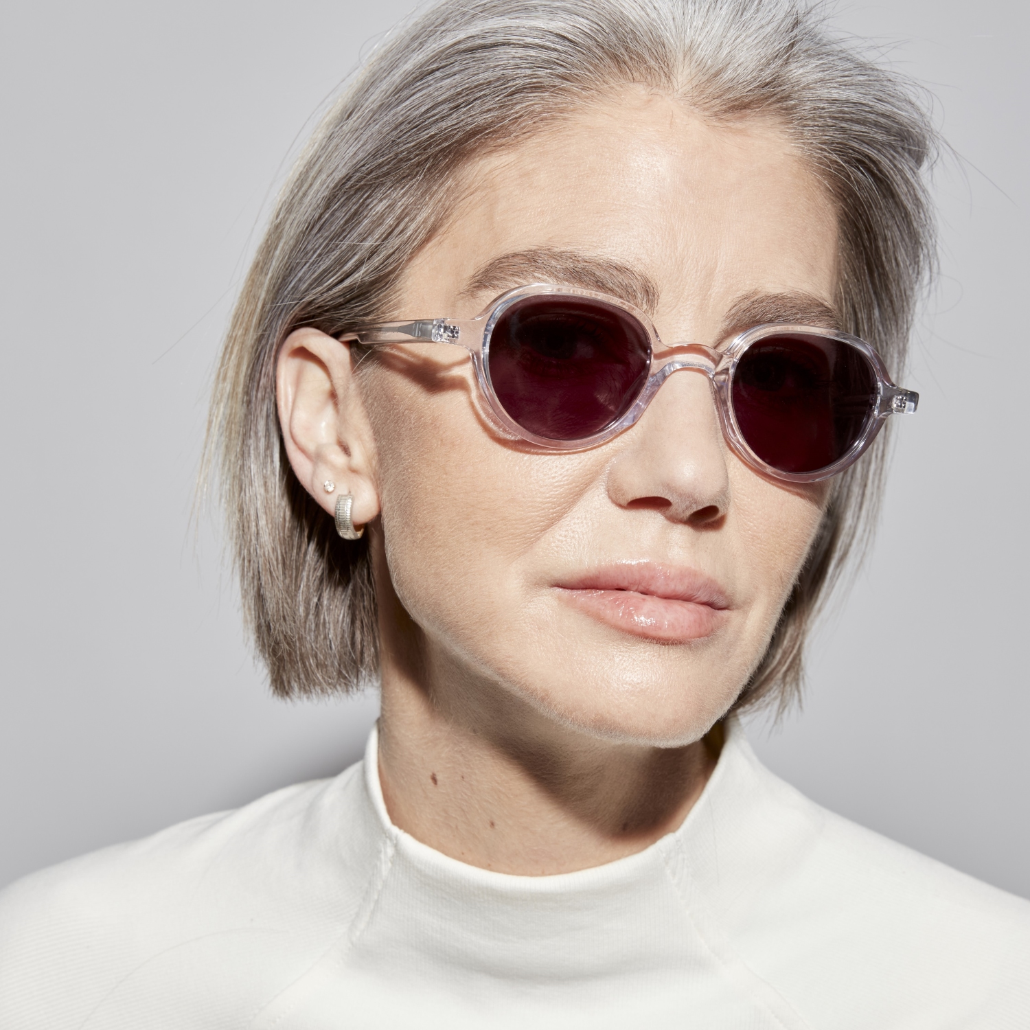 Photo of a man or woman wearing Gaby Sun Clear Dark Grey Sun Glasses by French Kiwis
