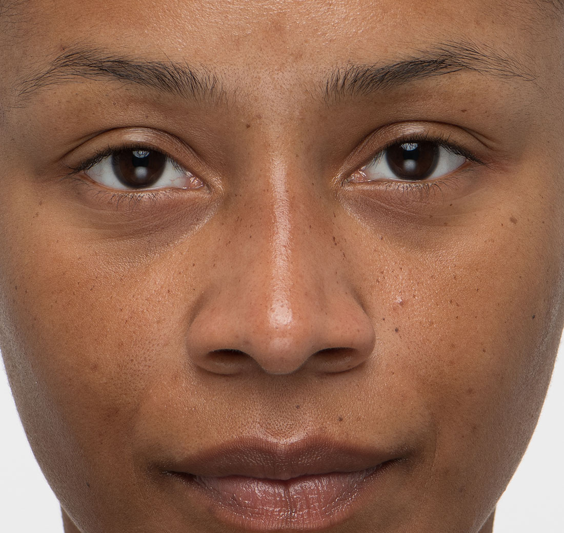 Close-up of eyebrows before using Obagi Nu-Cil Eyebrow Boosting Serum, with thin and uneven growth.